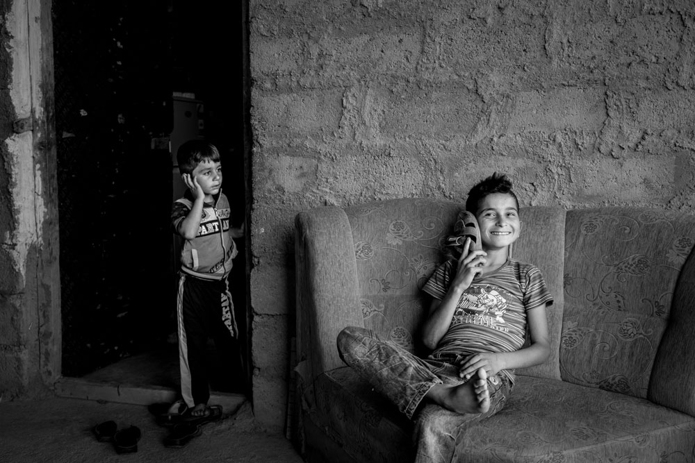  تصوير الكساندر افونسو - نازحون ايزديون لا يملكون شيئا لكنهم يهبون كل شيء 